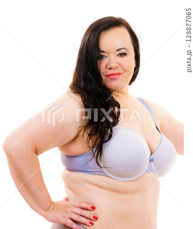 Big woman in bra, body positive. 128877065