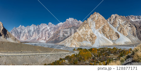 The autumn scenery with Tupopdan, Passu Cathedral or Passu Cones, is a mountain in northern Pakistan The autumn scenery with Tupopdan, Passu Cathedral or Passu Cones, is a mountain in northern Pakistan 128877171