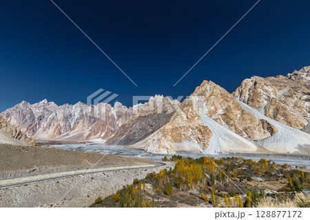 The autumn scenery with Tupopdan, Passu Cathedral or Passu Cones, is a mountain in northern Pakistan 128877172