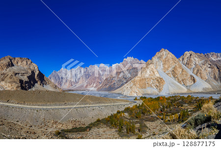 The autumn scenery with Tupopdan, Passu Cathedral or Passu Cones, is a mountain in northern Pakistan 128877175