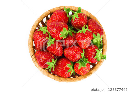 Strawberry in a wicker basket isolated on white background, Top view. Flat lay. 128877443