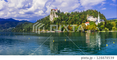 Beauty in nature. Lake scenery - magic lake Bled in Slowenia, popular tourist attraction Beauty in nature. Lake scenery - magic lake Bled in Slowenia, popular tourist attraction 128878539