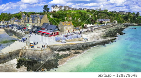 France travel, most scenic traditional villages in Brittany - beautiful Cancale, famous for oysters and turquoise sea. High angle drone panorama of old town and lighthouse 128878648