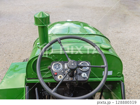 Old Tractor Steering Wheel Old Tractor Steering Wheel 128880319