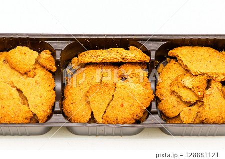 Cracked biscuits in box 128881121