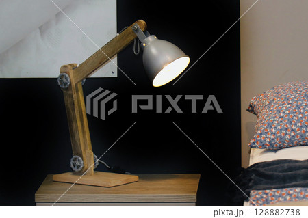Retro lamp on bedside table Retro lamp on bedside table 128882738