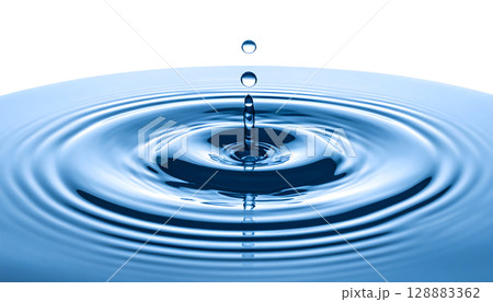 Water Drop Impact Creates Ripples 128883362