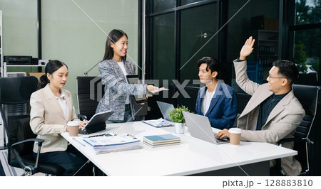 Young business creative team are brainstorming planning discussing while sitting in creative business discussing work 128883810