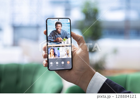 Entrepreneur discussing with shareholders about increasing profit strategy, meeting on online video call to plan the next steps in achieving the objectives. Corporate culture. 128884121