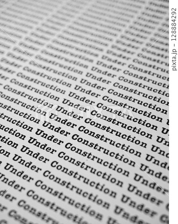 Words Under Construction Seamless print on paper for business background. 128884292