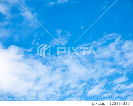 Blue sky with clouds background texture. Sky scape. Blue sky with clouds background texture. Sky scape. 128884330