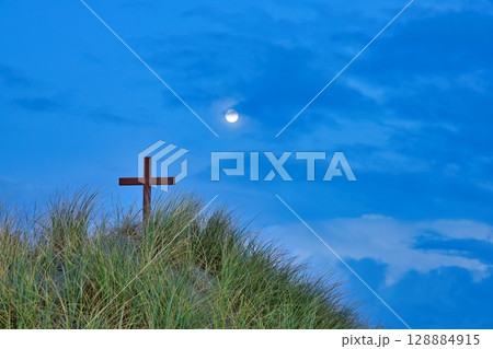 Wooden Cross On Beach Morning Storm Cloud Sky 128884915