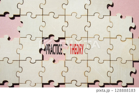 Theory or Practice symbol. Concept word Theory or Practice on wooden puzzle. Beautiful pink background. Business and Theory or Practice concept. Copy space 128888183