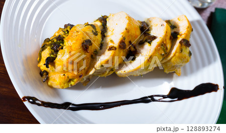 Roasted stuffed turkey breast Roasted stuffed turkey breast 128893274