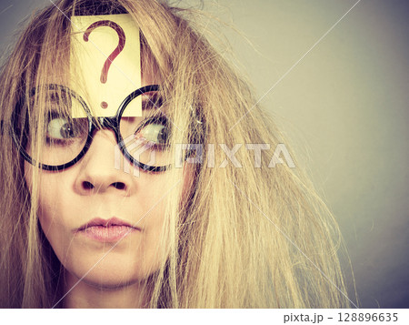 Tired crazy woman after intensive thinking 128896635