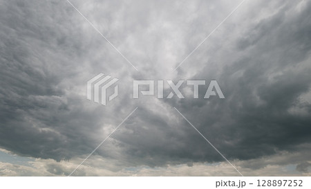 The Dramatic Overcast Skies with Dark Clouds Create an Unforgettable Visual Experience The Dramatic Overcast Skies with Dark Clouds Create an Unforgettable Visual Experience 128897252