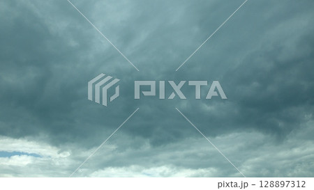 The skies are overcast today, adorned with dramatic cloud patterns that captivate the eye 128897312