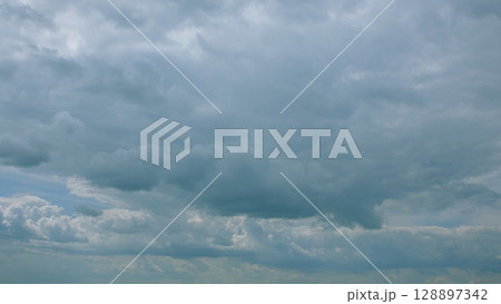 Dramatic and Beautiful Cloudy Sky Filled With Varied and Intriguing Cloud Textures 128897342
