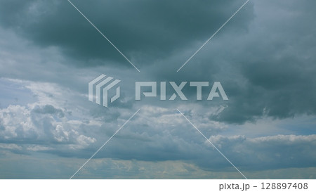 A stunning depiction of a cloudy sky with diverse, captivating weather patterns that inspire awe 128897408