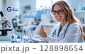 Doctor smiling and analyzing medical charts and graphs in laboratory 128898654