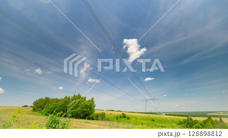 Huge Metal High Power Transmission Line Poles. Dynamic And Vibrant Power Transmission Lines Huge Metal High Power Transmission Line Poles. Dynamic And Vibrant Power Transmission Lines 128898812