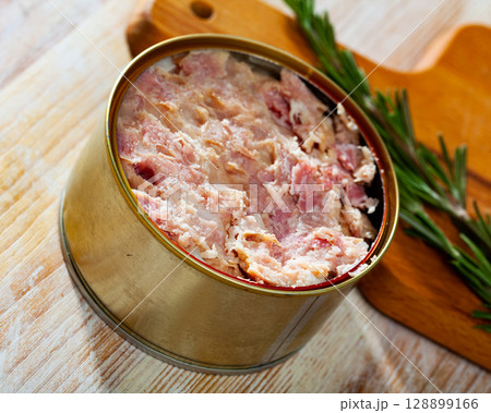 Preserved stewed meat on wooden table Preserved stewed meat on wooden table 128899166