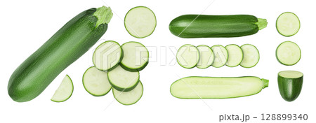 Fresh whole and sliced zucchini isolated on white background with full depth of field. Top view. Flat lay Fresh whole and sliced zucchini isolated on white background with full depth of field. Top view. Flat lay 128899340