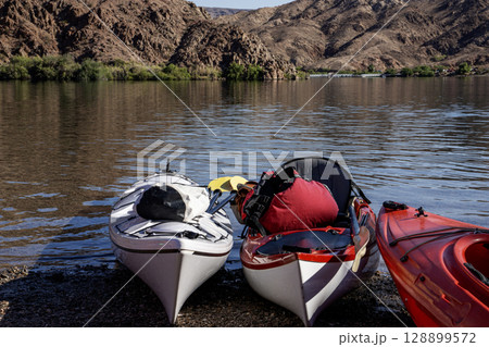 Kayaks Lined up at Copy Space on a Sunny Day in Arizona 128899572