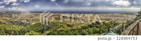 Panoramic view from Tibidabo mountain over Barcelona, Catalonia, Spain 128904753