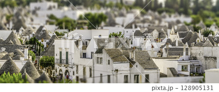 Scenic view of Alberobello and trulli, Italy. Tilt-shift effect applied 128905131