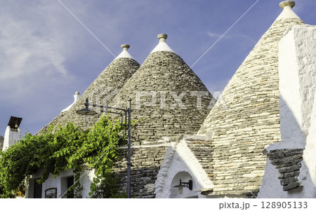 Typical trulli buildings in Alberobello, Apulia, Italy Typical trulli buildings in Alberobello, Apulia, Italy 128905133