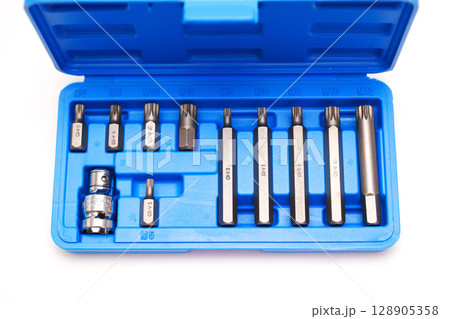 A set of single-sided chrome steel bits in a blue plastic box A set of single-sided chrome steel bits in a blue plastic box 128905358