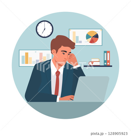 Businessman working on laptop in office with charts in background, analyzing data and planning. 128905923