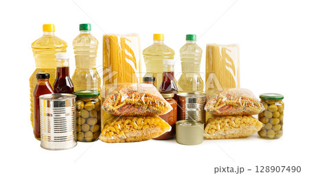 Vegetable oil and water in bottle isolated on white background. Vegetable oil and water in bottle isolated on white background. 128907490