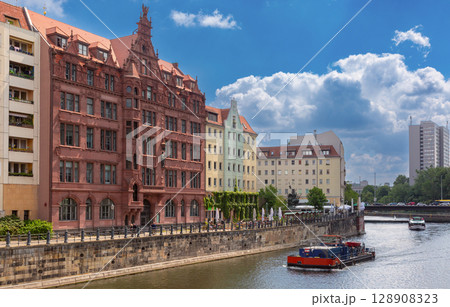 Spree River and historic buildings in Nikolaiviertel Berlin Germany Spree River and historic buildings in Nikolaiviertel Berlin Germany 128908323