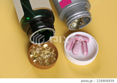 Multivitamins dietary supplement pills Multivitamins dietary supplement pills 128908939