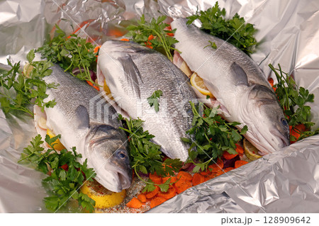 Fresh sea fish prepared for cooking 128909642