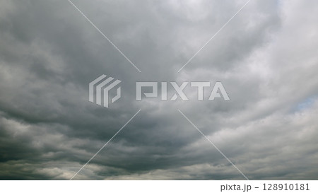 The Dramatic Overcast Sky Exhibits Rolling Clouds in a Captivating Display of Natures Mastery The Dramatic Overcast Sky Exhibits Rolling Clouds in a Captivating Display of Natures Mastery 128910181