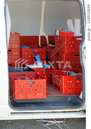 Open van door product delivery 128910684
