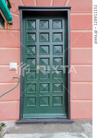 Closed metal entrance door Closed metal entrance door 128911152