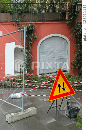 Construction site next to urban house Construction site next to urban house 128911155