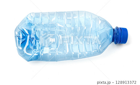 Crushed empty plastic water bottle with blue cap on white background 128913372