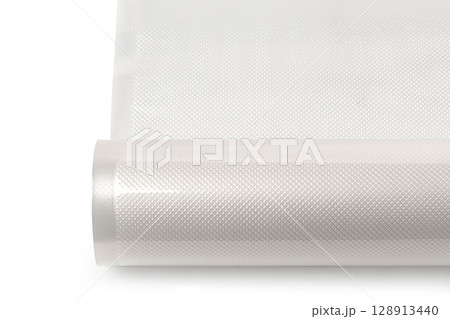 Roll of vacuum sealer bags embossed for food preservation on white background 128913440