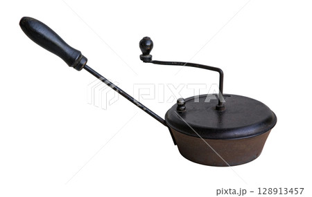 Antique coffee roaster showing rotating handle and wooden grip on white background 128913457