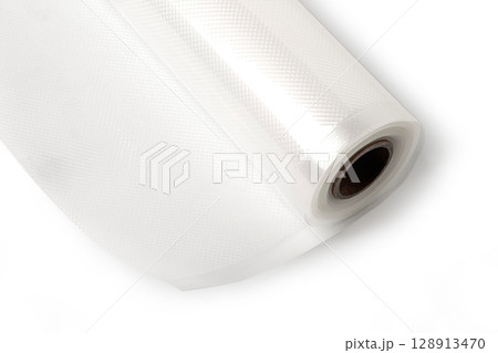 Roll of vacuum sealer bags embossed for food preservation on white background 128913470