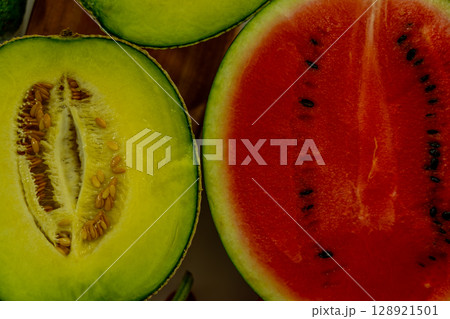 Sliced melon and watermelon close-up Sliced melon and watermelon close-up 128921501