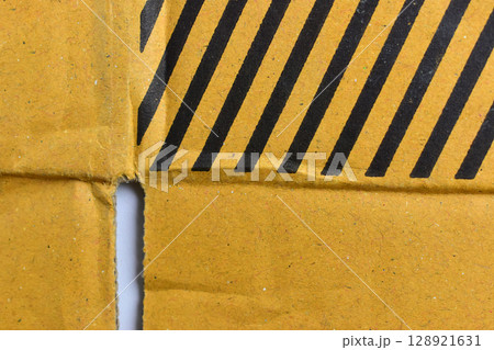 striped black and yellow cardboard box texture background striped black and yellow cardboard box texture background 128921631
