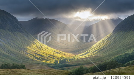 Dramatic Mountain Valley Sunrise Golden Light Rays Landscape Photography sky awe view wild calm 128924591
