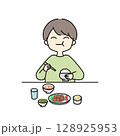ご飯をもりもり食べる男性 128925953