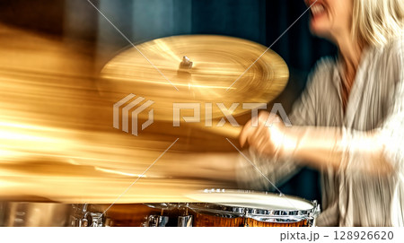 Professional drummer performing live with passion and energy 128926620